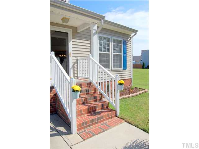 4105 Mantua Way Raleigh, NC 27604 - Photo 2 of 25 a view of a staircase with a small garden