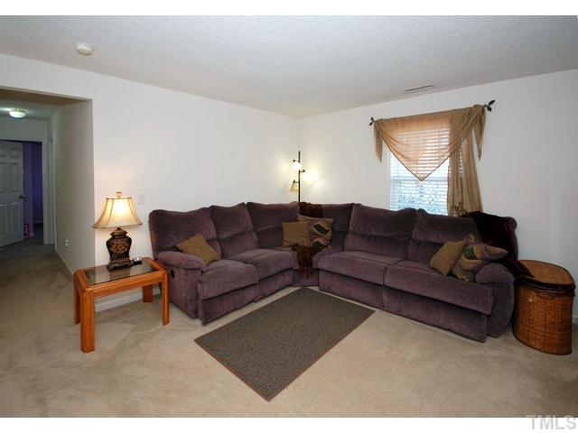 4105 Mantua Way Raleigh, NC 27604 - Photo 21 of 25 a living room with furniture and a window