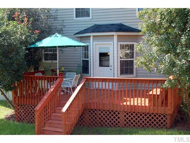 4105 Mantua Way Raleigh, NC 27604 - Photo 22 of 25 a view of a wooden deck with a bench