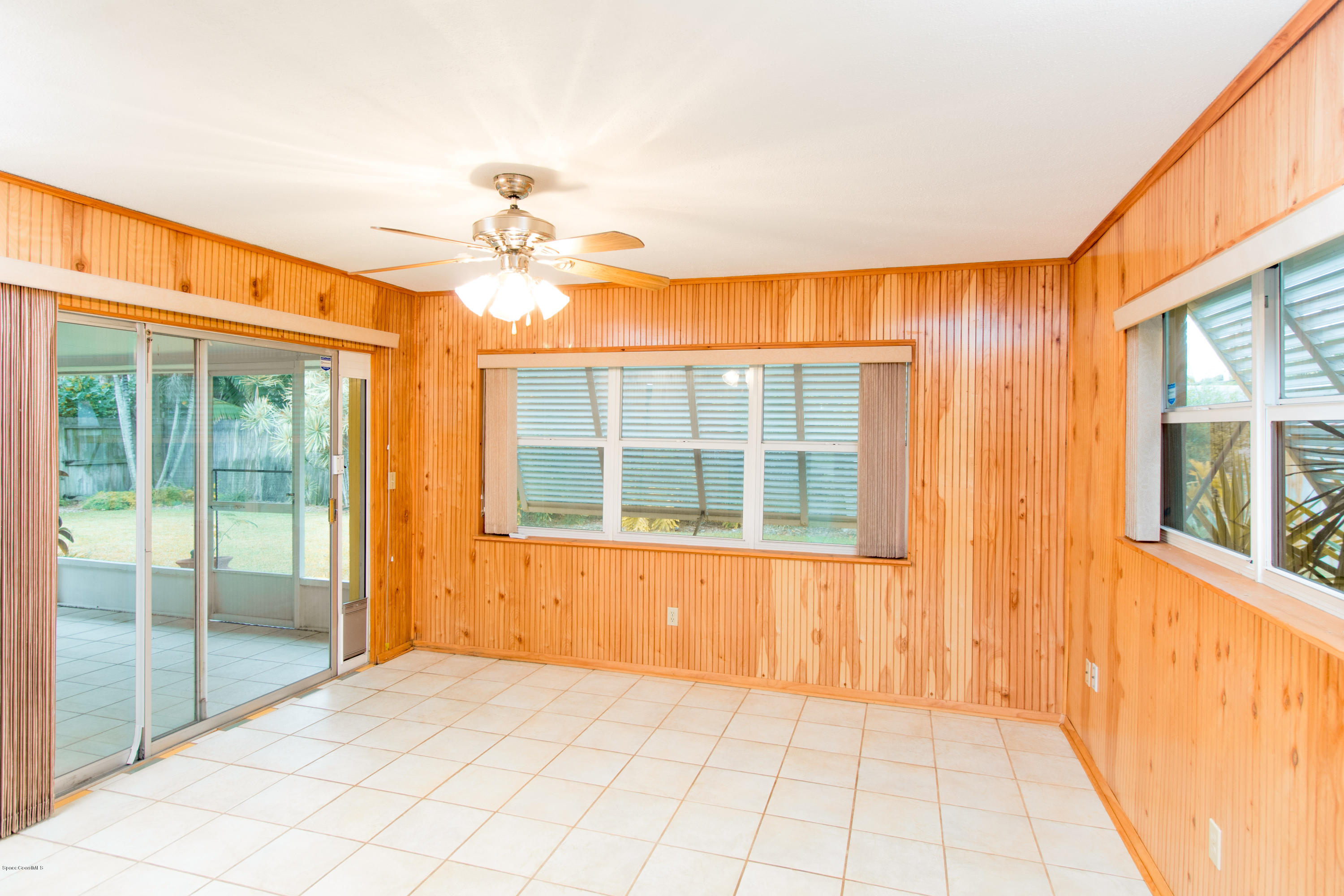 1054 Bali Road Cocoa Beach, FL 32931 - Photo 12 of 24 a view of an empty room with a window