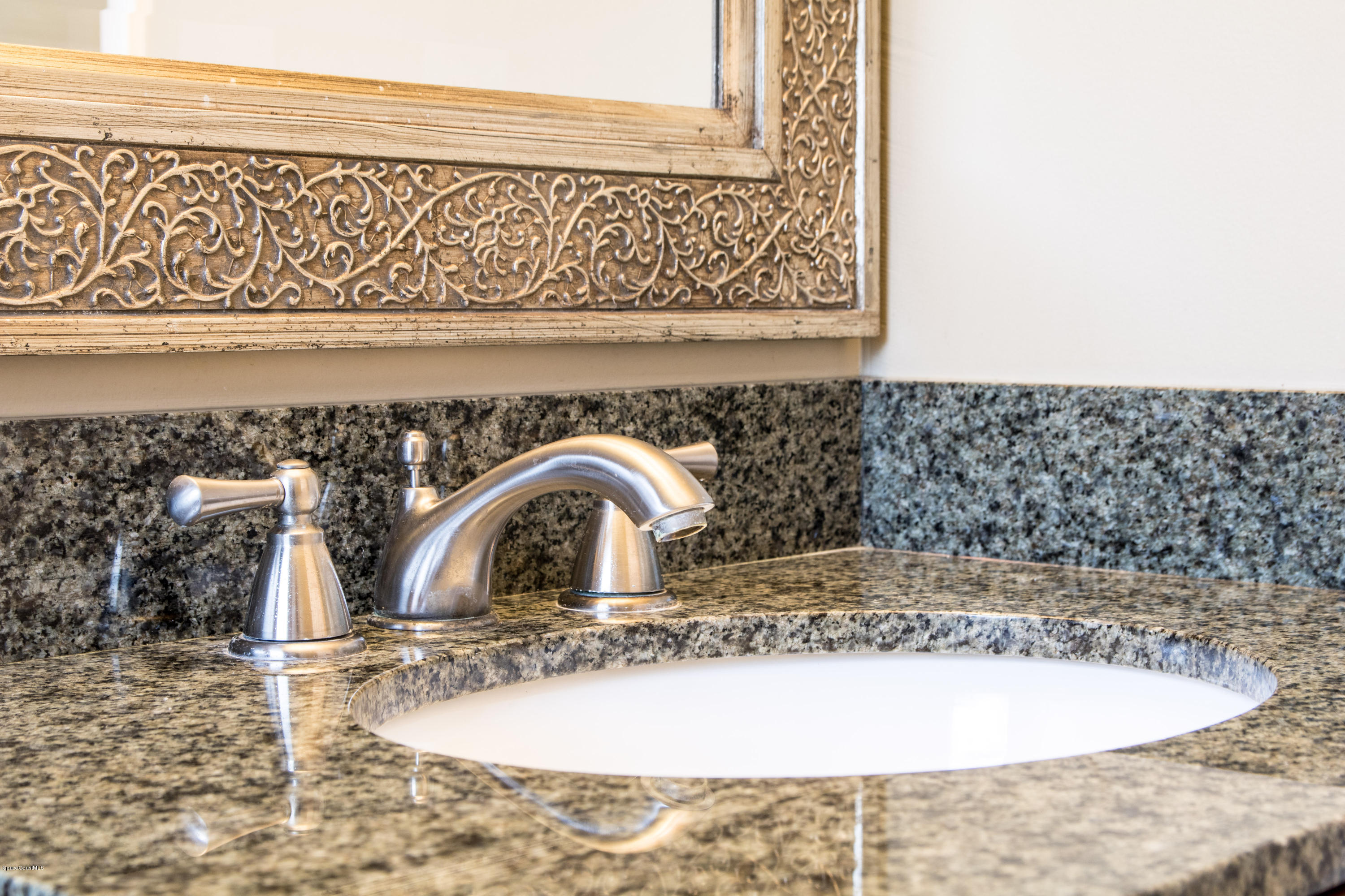 1054 Bali Road Cocoa Beach, FL 32931 - Photo 14 of 24 a view of a sink