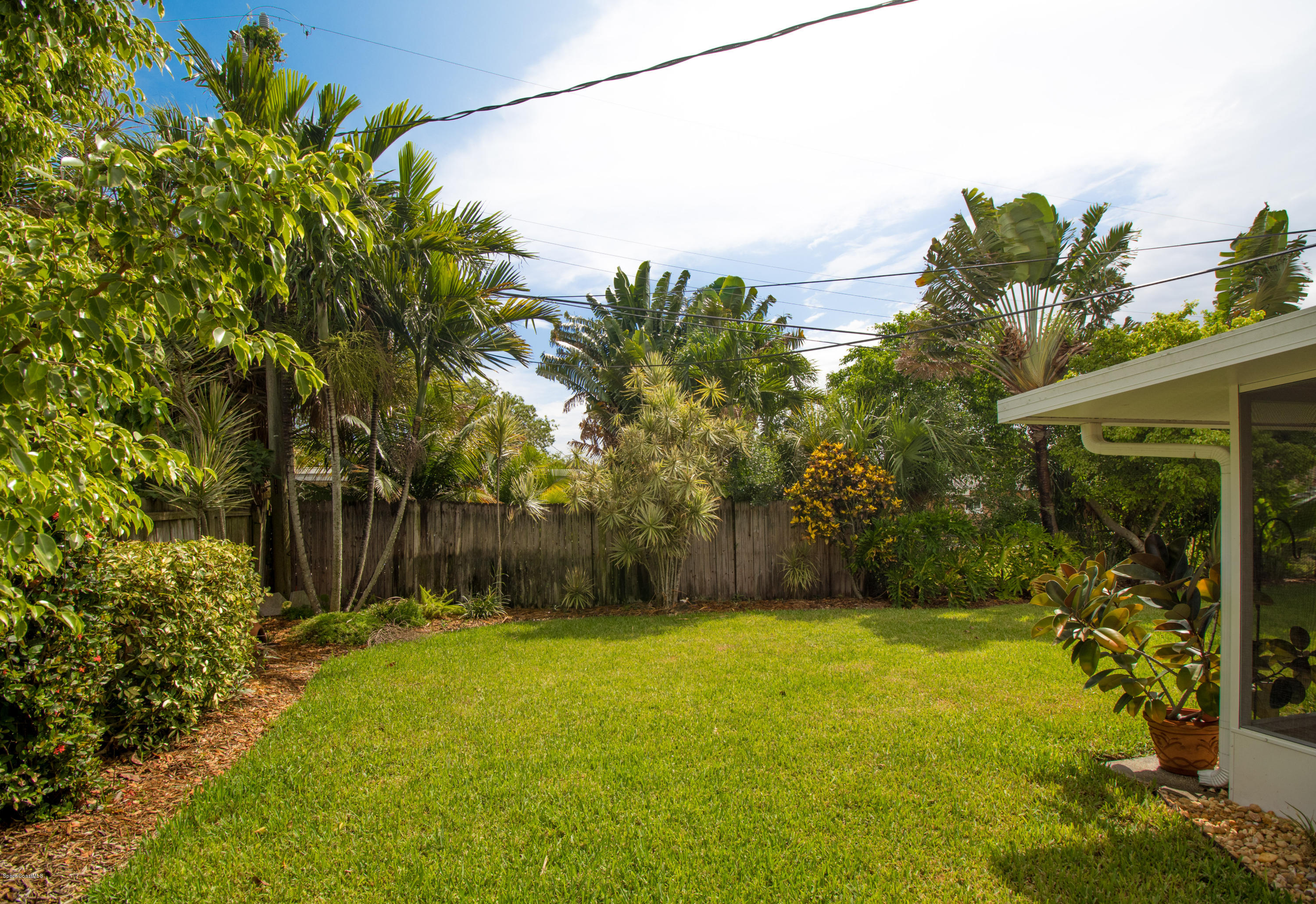 1054 Bali Road Cocoa Beach, FL 32931 - Photo 24 of 24 a view of a yard