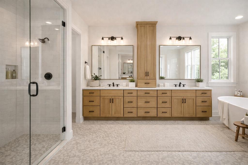 1630 Murphy Street Oviedo, FL 32765 - Photo 10 of 22 a spacious bathroom with a double vanity sink a mirror a window and a bathtub