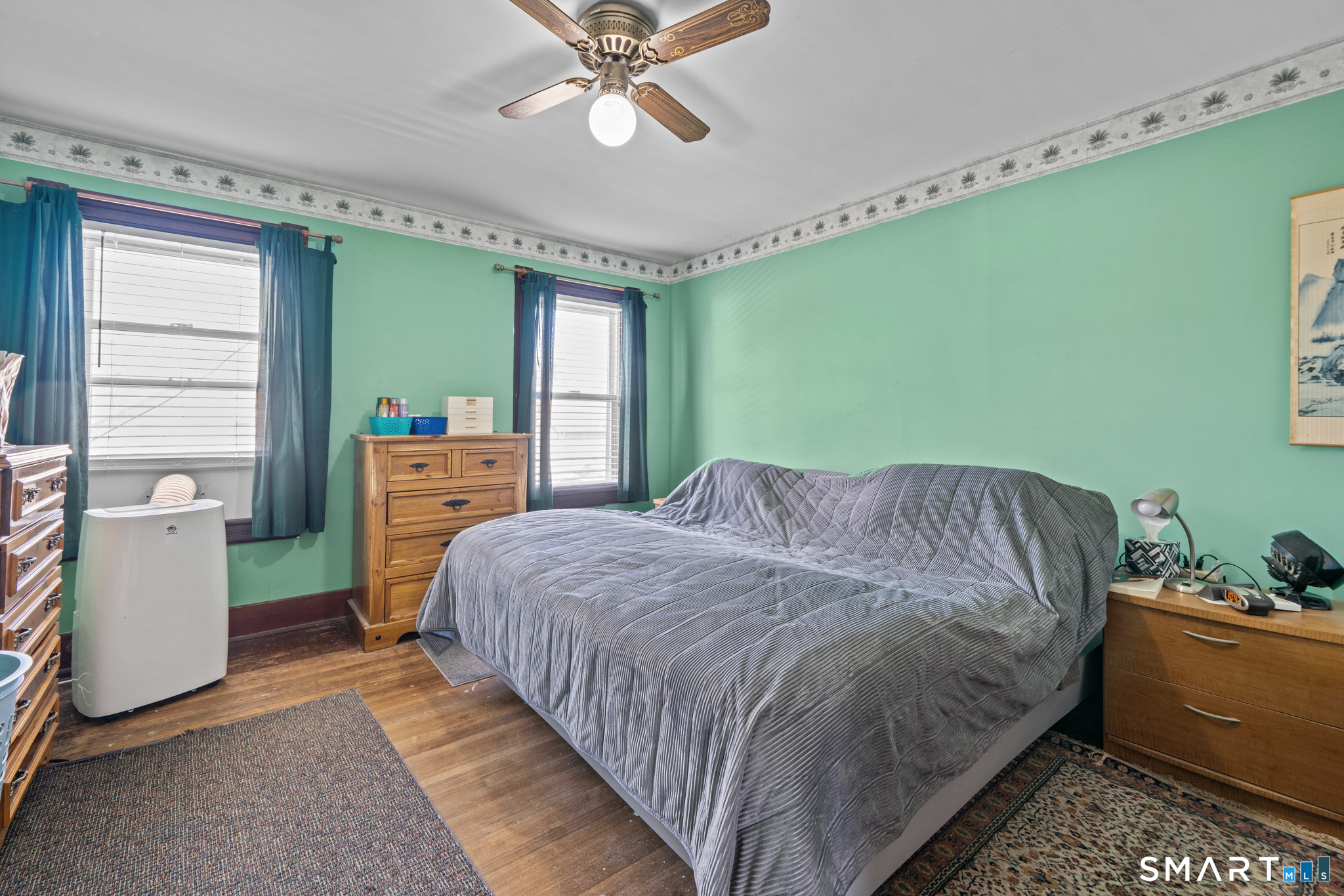 5 8th Street Plainfield, CT 06374 - Photo 16 of 40 a bedroom with a bed and a window