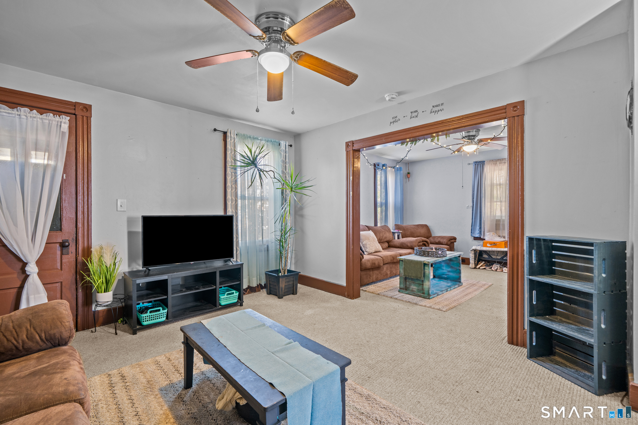 5 8th Street Plainfield, CT 06374 - Photo 22 of 40 a living room with furniture and a flat screen tv