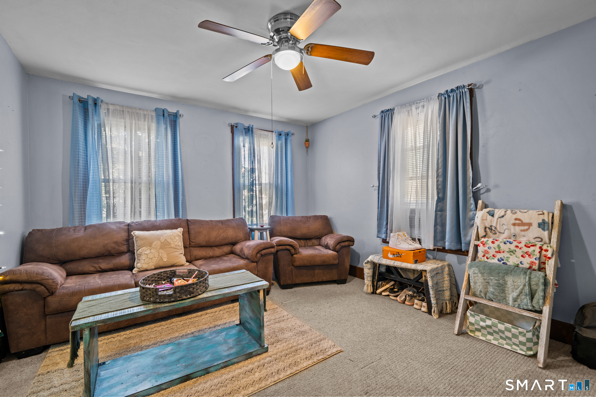 5 8th Street Plainfield, CT 06374 - Photo 24 of 40 a living room with furniture and a window
