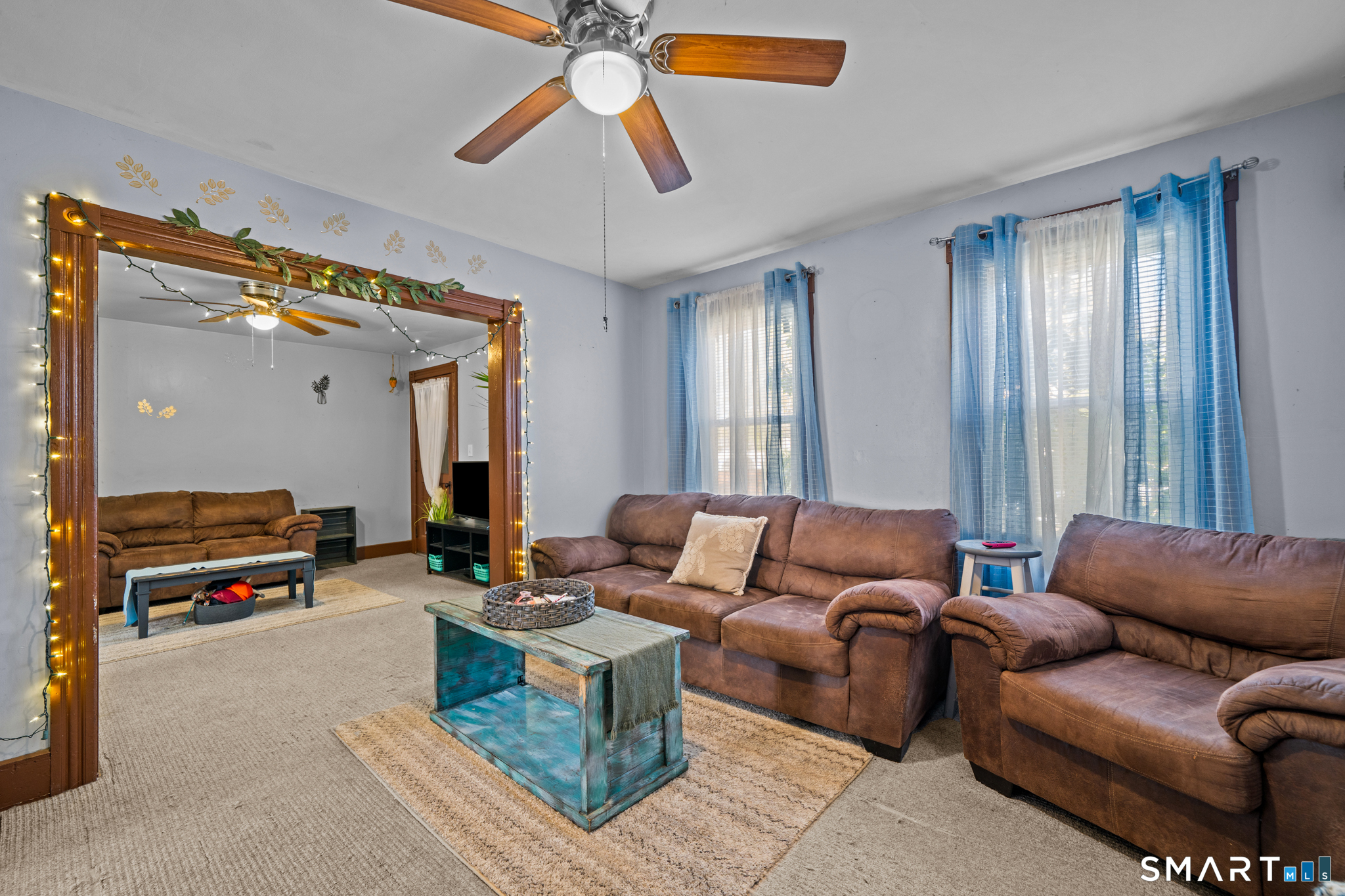 5 8th Street Plainfield, CT 06374 - Photo 26 of 40 a living room with furniture and a window