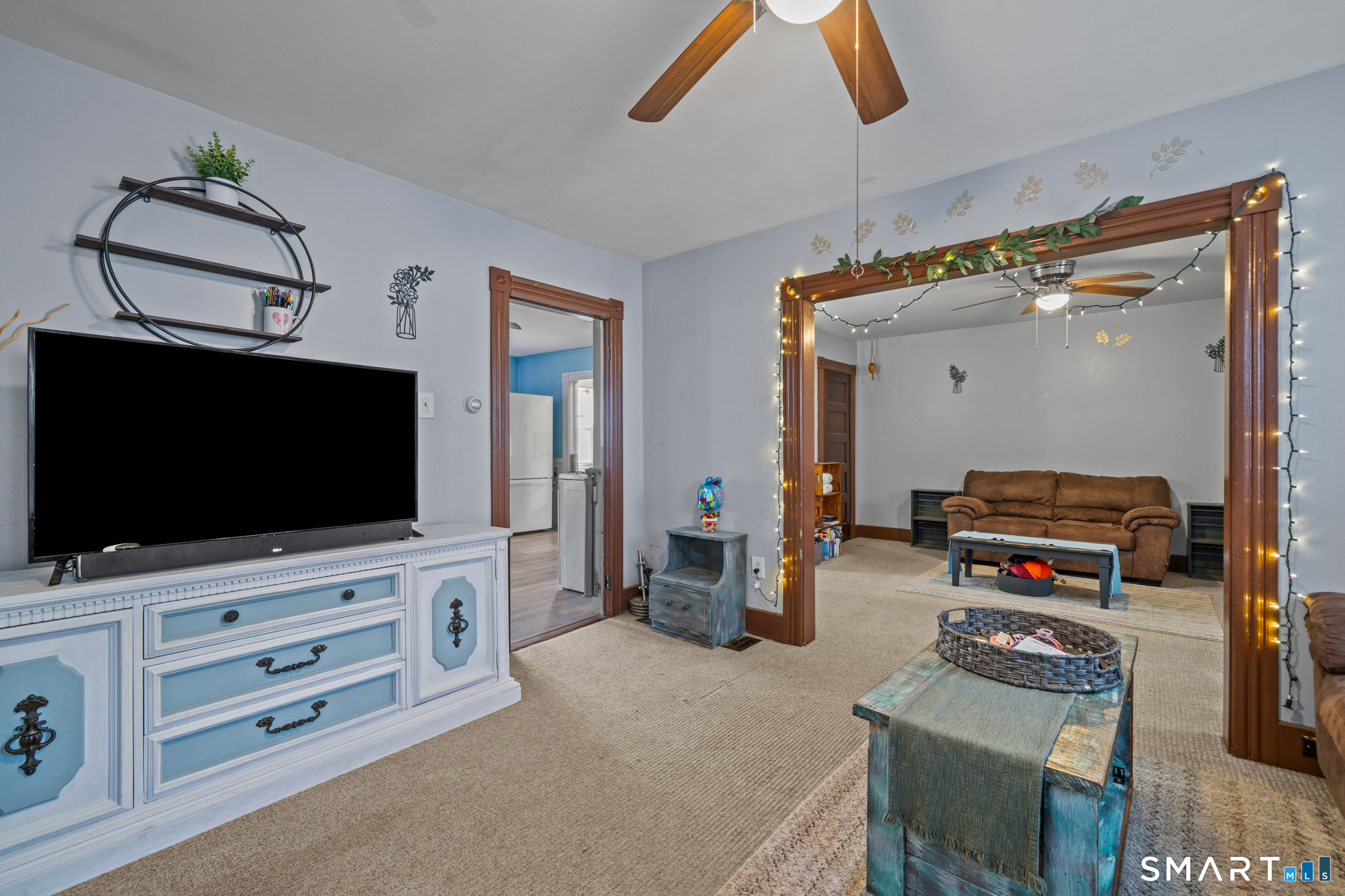 5 8th Street Plainfield, CT 06374 - Photo 27 of 40 a living room with furniture and a flat screen tv