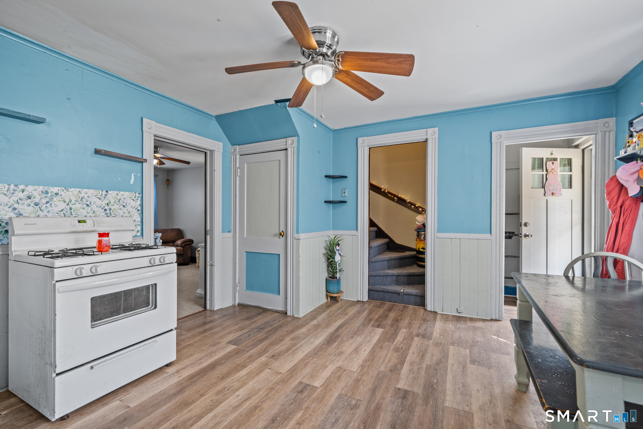 5 8th Street Plainfield, CT 06374 - Photo 31 of 40 a kitchen with a stove a refrigerator and a sink