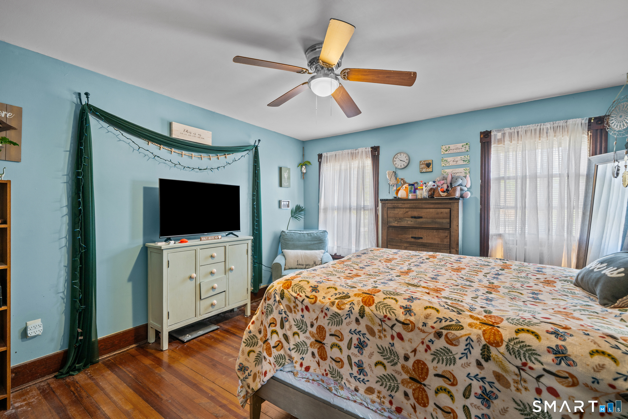 5 8th Street Plainfield, CT 06374 - Photo 32 of 40 a bedroom with a bed and a flat screen tv