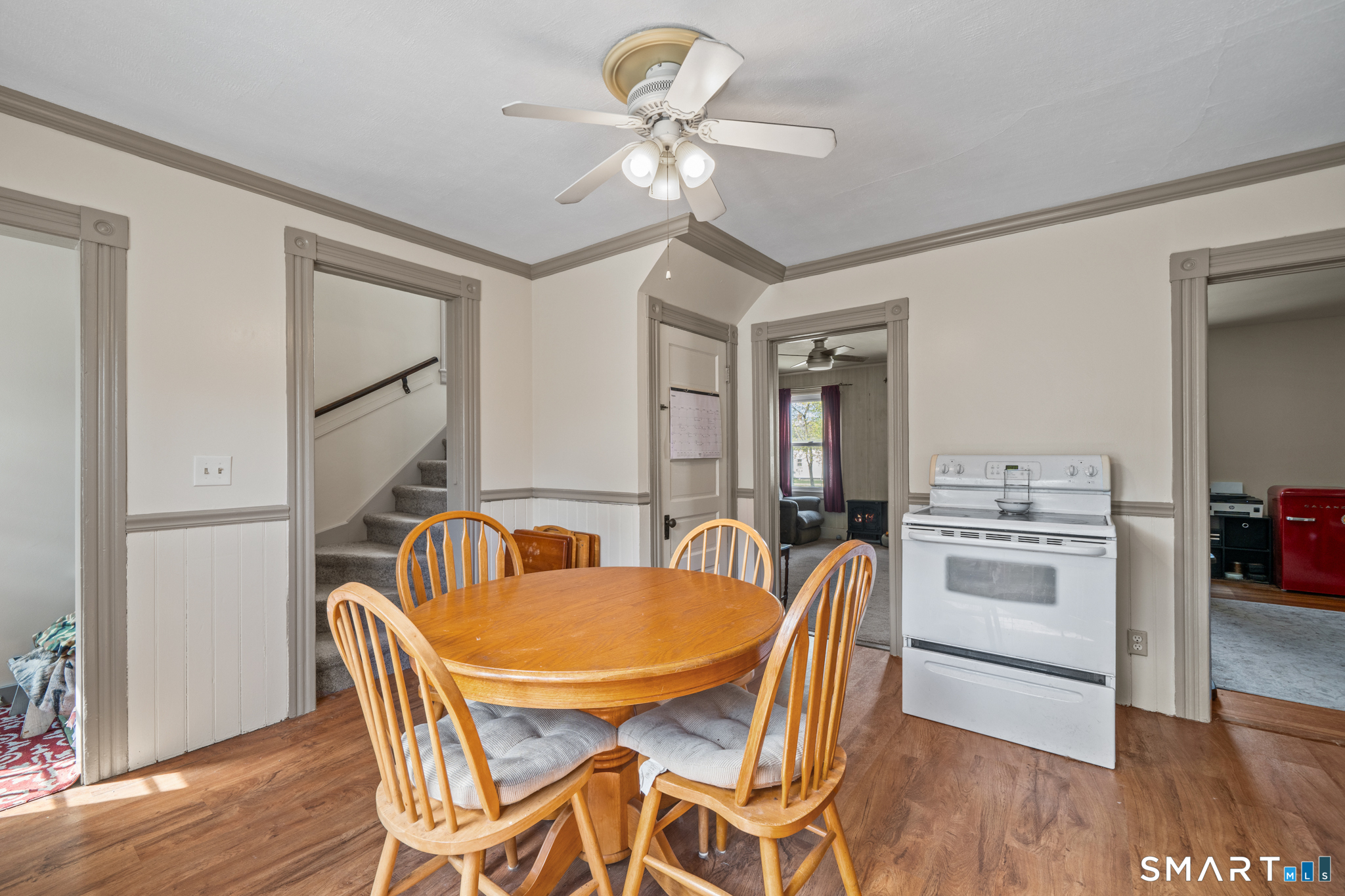 5 8th Street Plainfield, CT 06374 - Photo 8 of 40 a view of a dining room with furniture and wooden floor