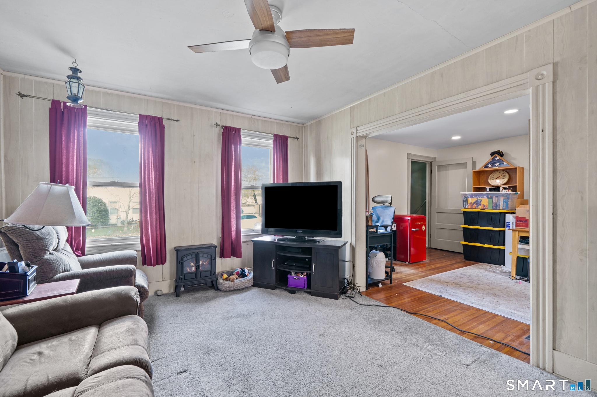 5 8th Street Plainfield, CT 06374 - Photo 10 of 40 a living room with furniture and a flat screen tv