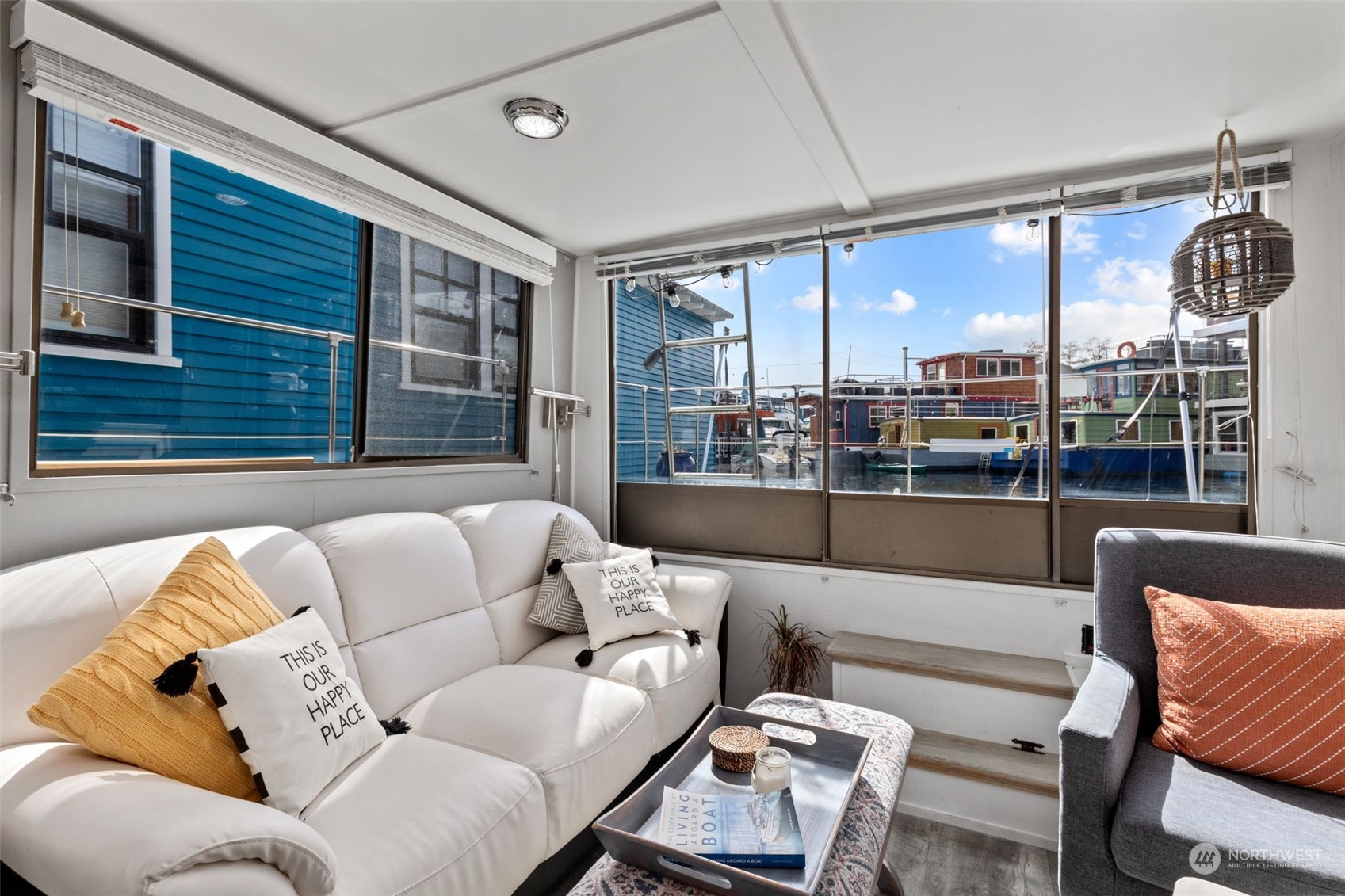 2401 North Northlake Way, Unit E6 Seattle, WA 98103 - Photo 3 of 25 a living room with furniture and a large window