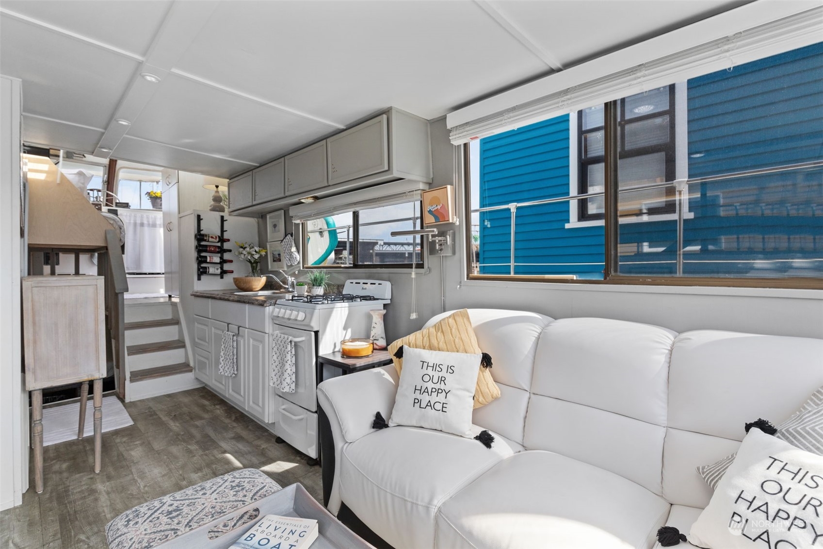 2401 North Northlake Way, Unit E6 Seattle, WA 98103 - Photo 4 of 25 a living room with furniture and a fireplace