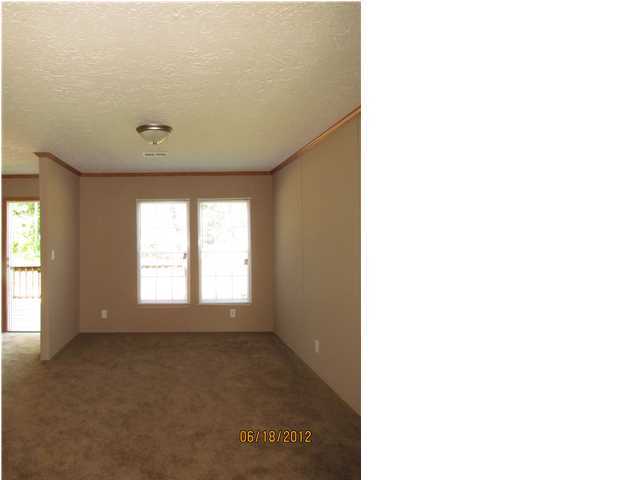 5825 Bush Road Baker, FL 32531 - Photo 19 of 27 a view of an empty room with a window