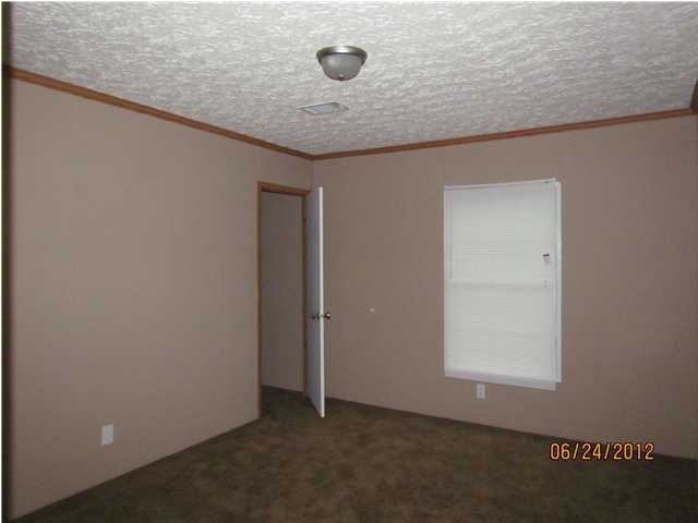 5825 Bush Road Baker, FL 32531 - Photo 22 of 27 an empty room with windows