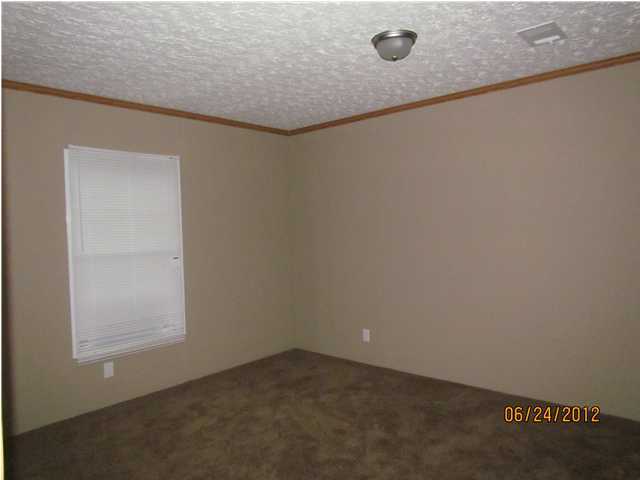 5825 Bush Road Baker, FL 32531 - Photo 23 of 27 an empty room with a window
