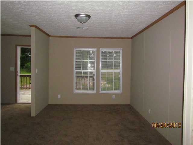 5825 Bush Road Baker, FL 32531 - Photo 5 of 27 an empty room with a window