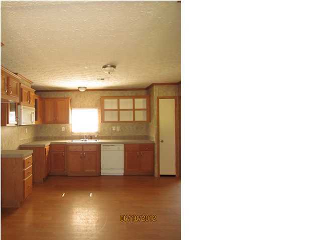 5825 Bush Road Baker, FL 32531 - Photo 6 of 27 a kitchen with sink and window