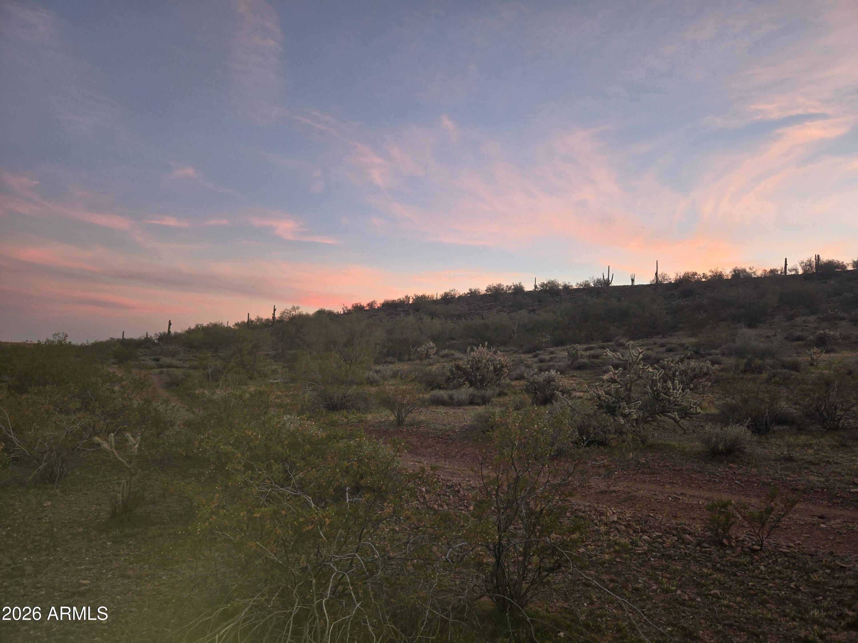 43325 North Castle Hot Springs Road Morristown, AZ 85342 - Photo 4 of 7 a view of a city with lush green forest