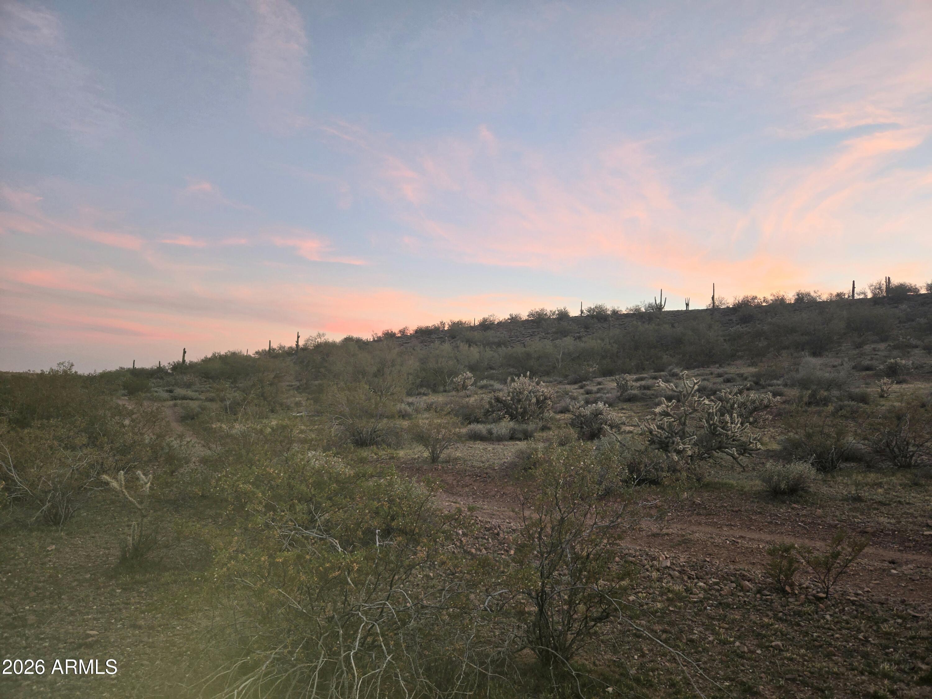 43325 North Castle Hot Springs Road Morristown, AZ 85342 - Photo 5 of 7 a view of a city with lush green forest