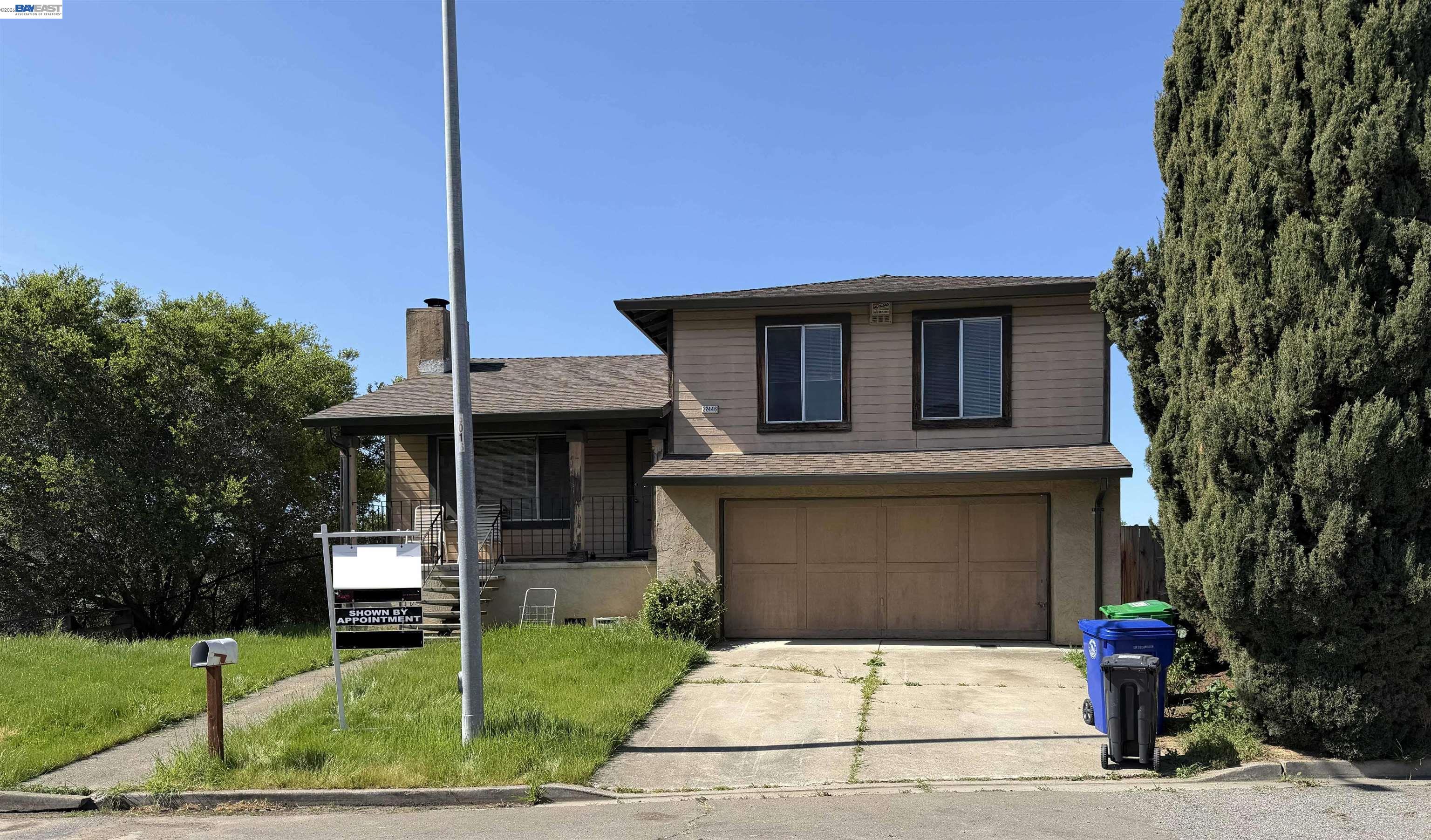 22446 Ralston Lane Hayward, CA 94541 - Photo 1 of 1 a front view of a house with garden
