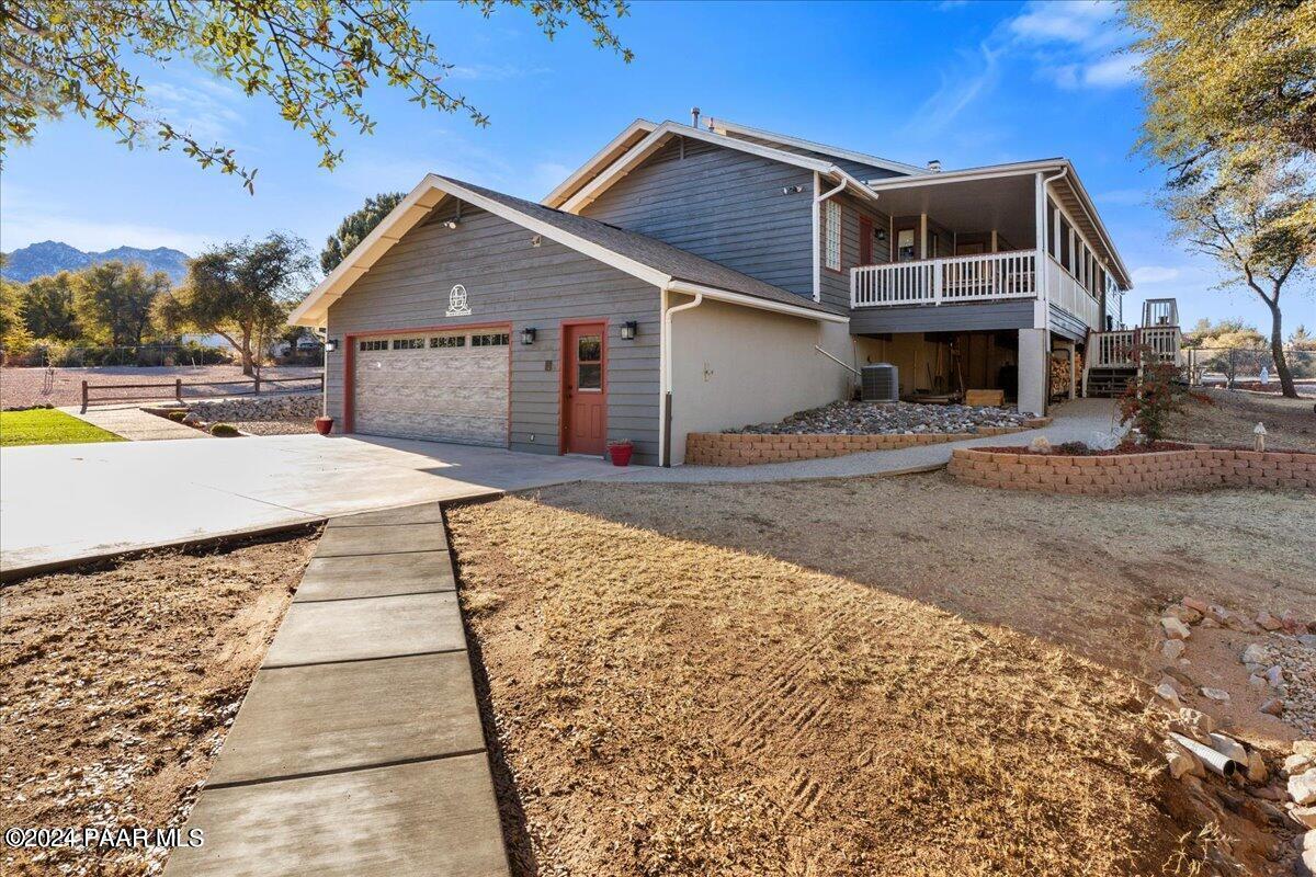 2600 West Bard Ranch Road Prescott, AZ 86305 - Photo 8 of 42 ATTACHED GARAGE AND BACK OF HOME