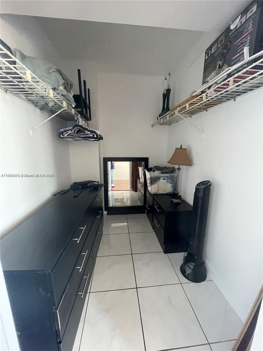 2899 Collins Avenue, Unit 1420 Miami Beach, FL 33140 - Photo 13 of 17 a living room with furniture