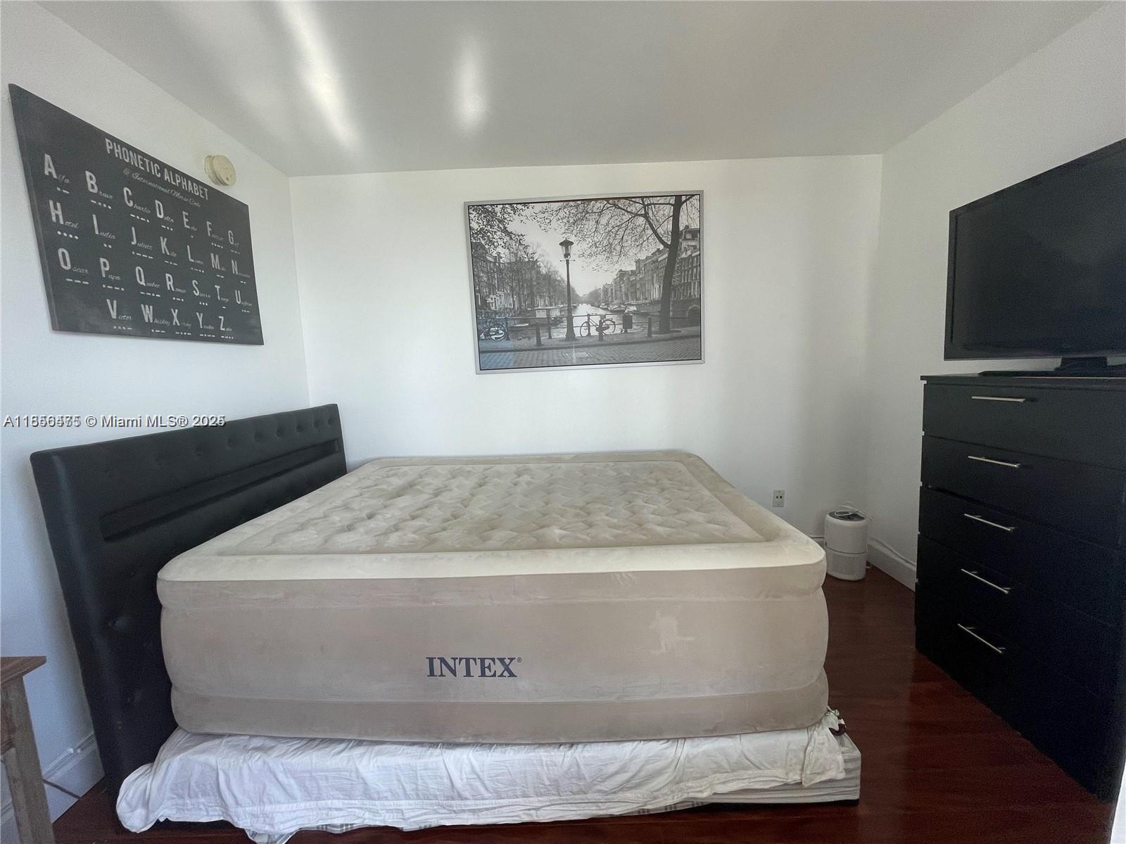 2899 Collins Avenue, Unit 1420 Miami Beach, FL 33140 - Photo 14 of 17 a view of washer and dryer