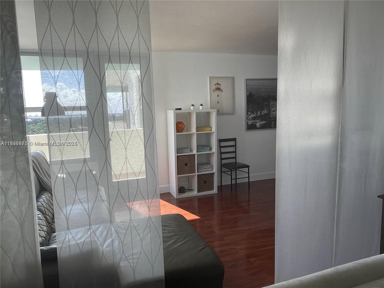 2899 Collins Avenue, Unit 1420 Miami Beach, FL 33140 - Photo 16 of 17 a room with window