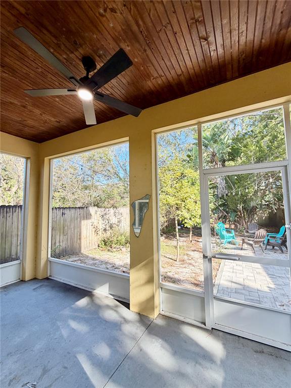 4848 Tampa Downs Boulevard Lutz, FL 33559 - Photo 16 of 27 a view of an empty room with a fireplace