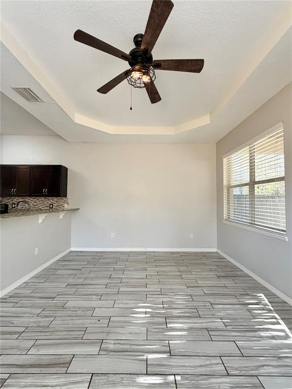 4848 Tampa Downs Boulevard Lutz, FL 33559 - Photo 18 of 27 a view of an empty room and window