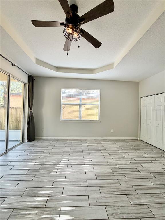4848 Tampa Downs Boulevard Lutz, FL 33559 - Photo 19 of 27 a view of an empty room and window