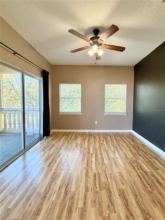 4848 Tampa Downs Boulevard Lutz, FL 33559 - Photo 7 of 27 a view of an empty room and window