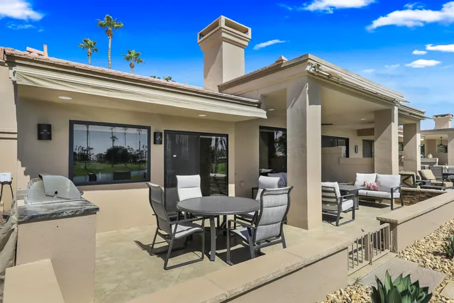 a view of a house with sitting area