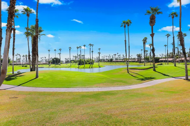 a view of a playground with basketball court