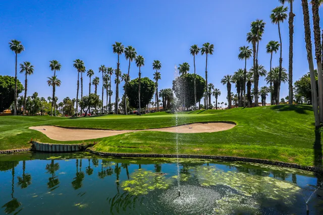 a view of a golf course with a garden