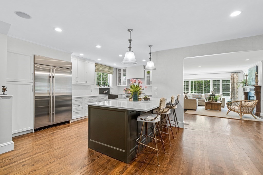 25 Emerson Road Wellesley, MA 02481 - Photo 11 of 42 a view of a dining room with furniture window and wooden floor