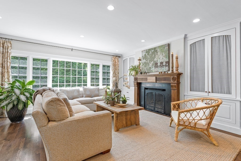 25 Emerson Road Wellesley, MA 02481 - Photo 18 of 42 a living room with furniture and a fireplace