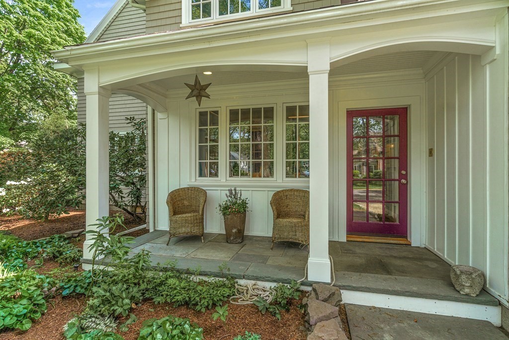 25 Emerson Road Wellesley, MA 02481 - Photo 2 of 42 a front view of a house with a yard