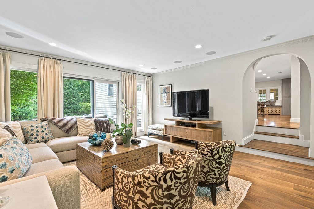25 Emerson Road Wellesley, MA 02481 - Photo 23 of 42 a living room with furniture and a flat screen tv