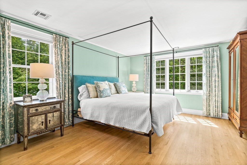 25 Emerson Road Wellesley, MA 02481 - Photo 25 of 42 a bedroom with a bed and large window