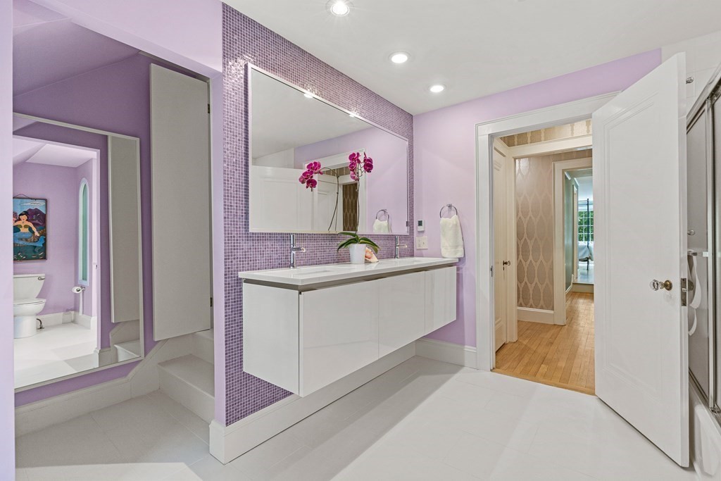 25 Emerson Road Wellesley, MA 02481 - Photo 31 of 42 a bathroom with a sink vanity and mirror