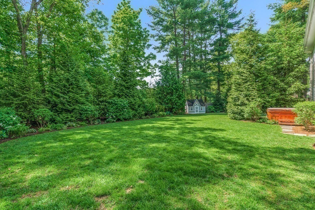 25 Emerson Road Wellesley, MA 02481 - Photo 37 of 42 a backyard of a house with lots of green space