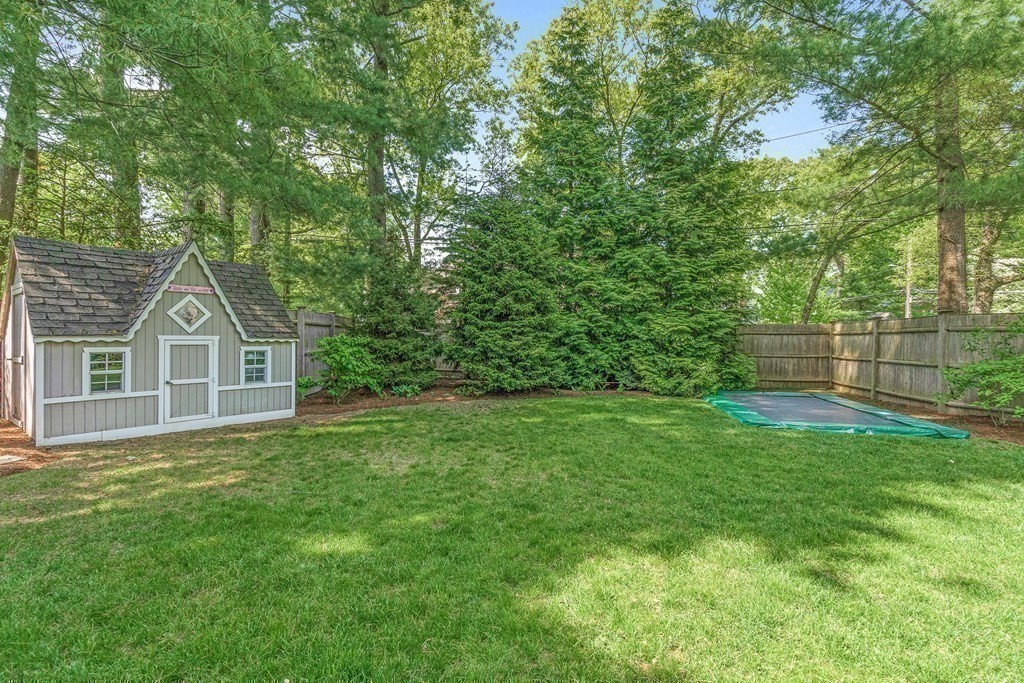 25 Emerson Road Wellesley, MA 02481 - Photo 38 of 42 a front view of a house with a yard