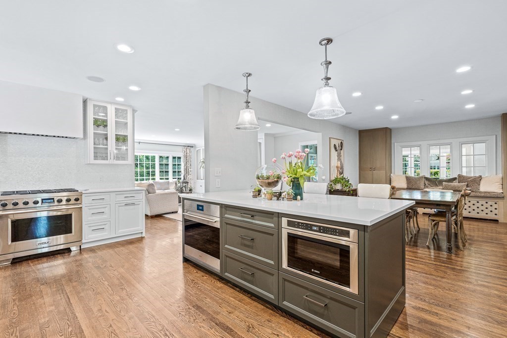 25 Emerson Road Wellesley, MA 02481 - Photo 8 of 42 a kitchen with a stove and a wooden floor