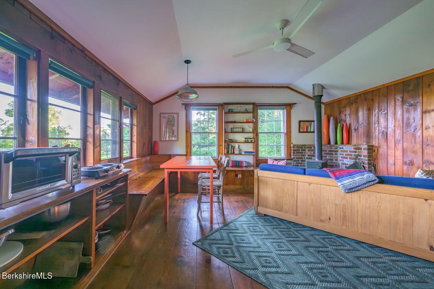 651 Hayes Hill Road New Marlborough, MA 01244 - Photo 58 of 75 THE GREAT ROOM WITH WOOD BURNING STOVE