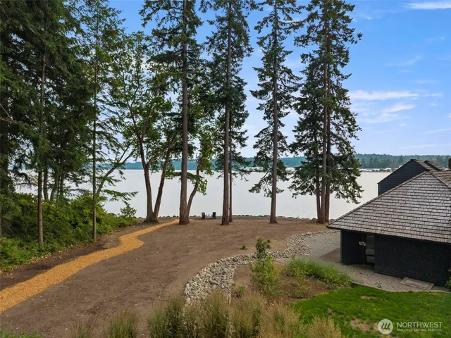 a view of a yard with table and chairs