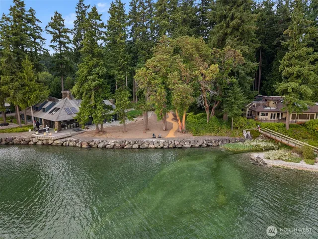 a view of a street with a house in background