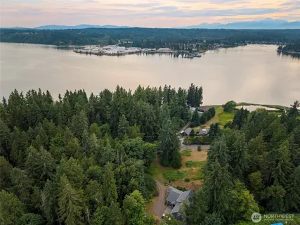 a view of lake with green space